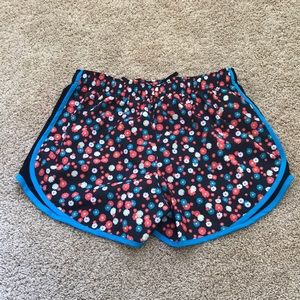 NWT! Nike black/ blue multi combo running shorts .